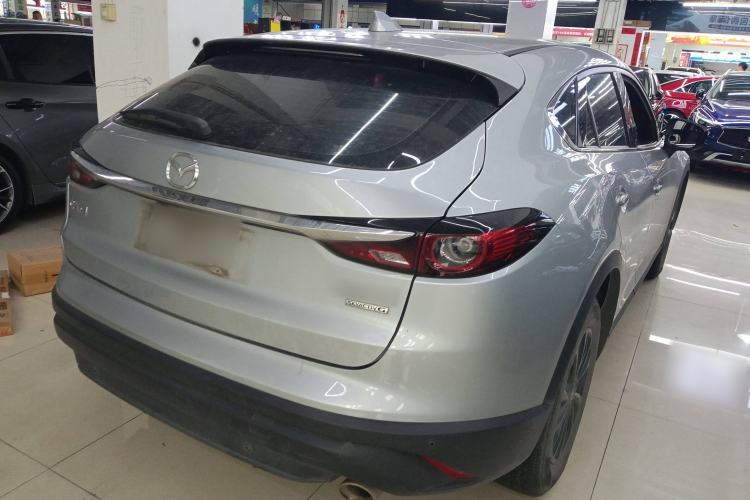 Used Mazda CX-4 2021 2.0L Automatic Two-Wheel Drive Blue Sky Dynamic Edition Rear Right 45 Deg
