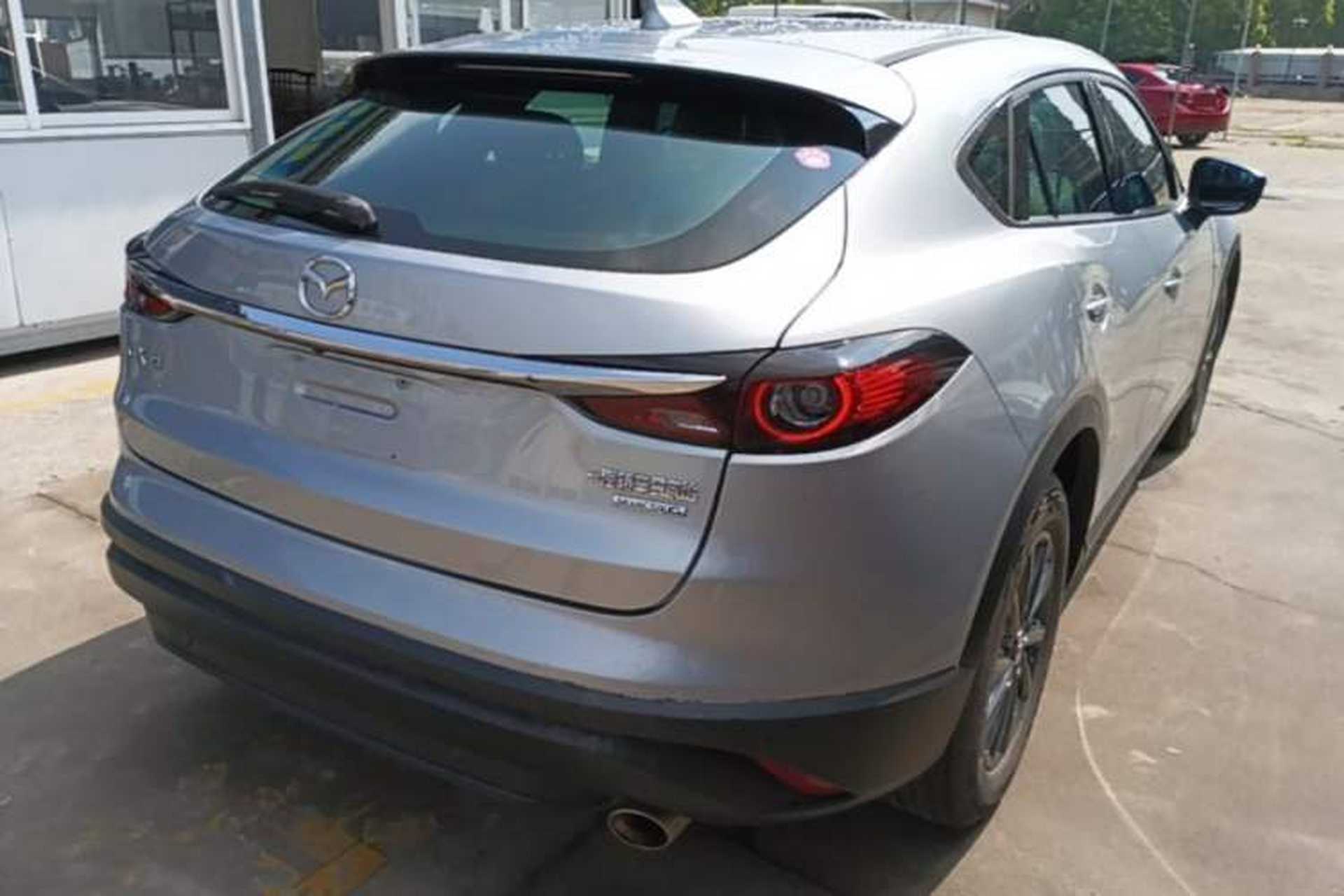 Used Mazda CX-4 2021 2.0L Automatic Two-Wheel Drive Blue Sky Dynamic Edition Rear Right 45 Deg