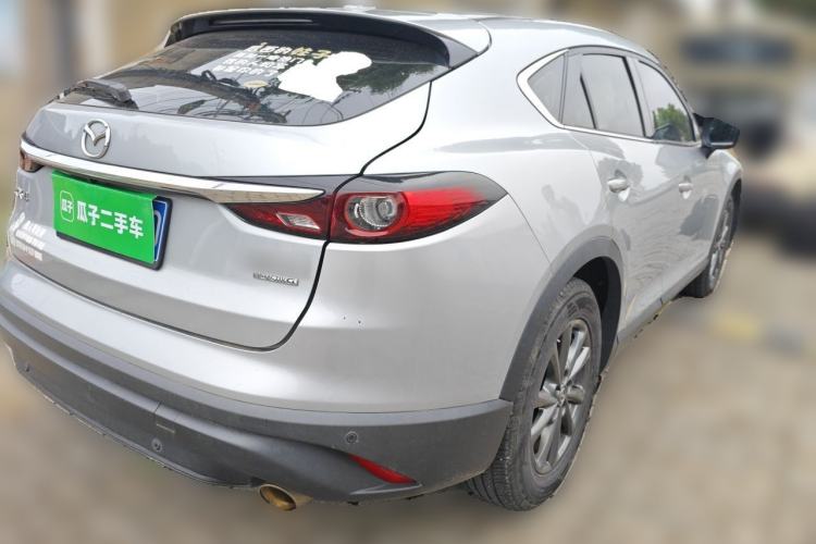 Used Mazda CX-4 2021 2.0L Automatic Two-Wheel Drive Blue Sky Dynamic Edition Rear Right 45 Deg