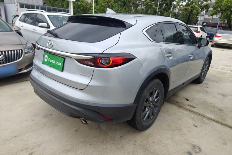 Used Mazda CX-4 2021 2.0L Automatic Two-Wheel Drive Blue Sky Dynamic Edition Rear Right 45 Deg