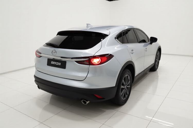 Used Mazda CX-4 2021 2.0L Automatic Two-Wheel Drive Blue Sky Dynamic Edition Rear Right 45 Deg