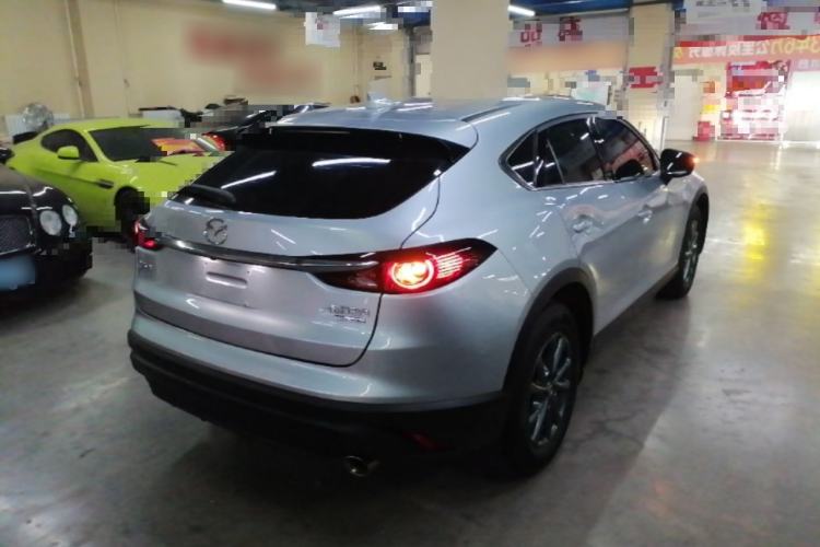 Used Mazda CX-4 2021 2.0L Automatic Two-Wheel Drive Blue Sky Dynamic Edition Rear Right 45 Deg