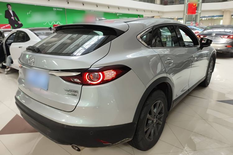 Used Mazda CX-4 2021 2.0L Automatic Two-Wheel Drive Blue Sky Dynamic Edition Rear Right 45 Deg