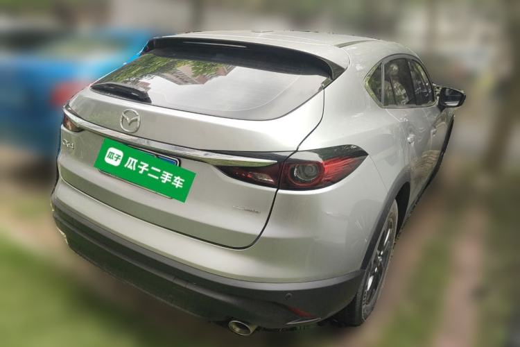 Used Mazda CX-4 2021 2.0L Automatic Two-Wheel Drive Blue Sky Exploration Edition Rear Right 45 Deg