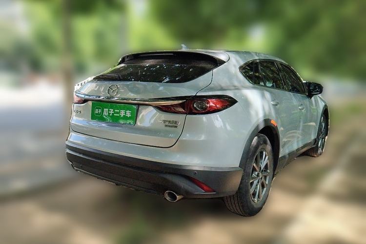 Used Mazda CX-4 2021 2.0L Automatic Two-Wheel Drive Blue Sky Dynamic Edition Rear Right 45 Deg