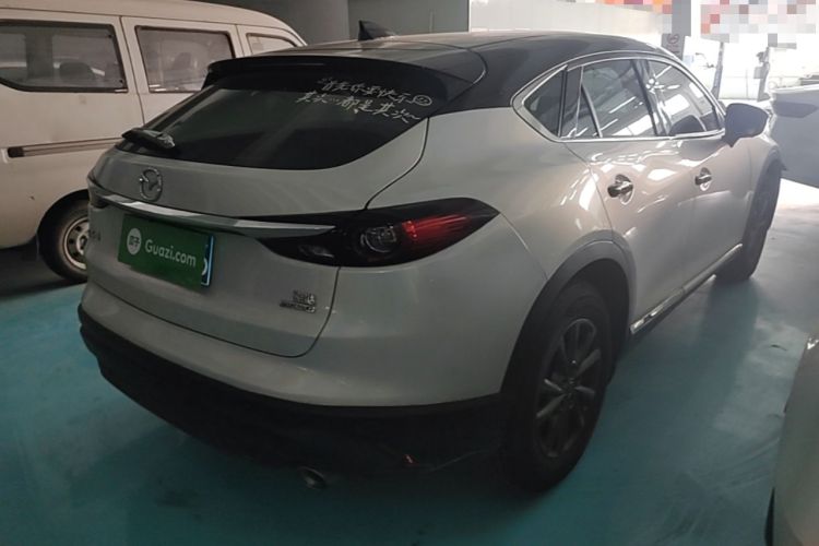 Used Mazda CX-4 2021 2.0L Automatic Two-Wheel Drive Blue Sky Dynamic Edition Rear Right 45 Deg