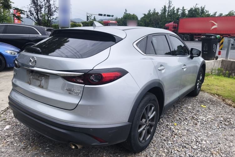 Used Mazda CX-4 2021 2.0L Automatic Two-Wheel Drive Blue Sky Dynamic Edition Rear Right 45 Deg