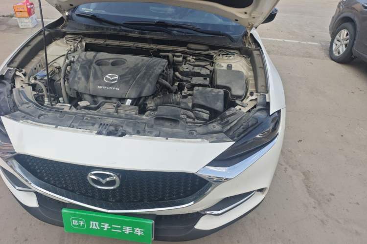Used Mazda CX-4 2021 2.0L Automatic Two-Wheel Drive Blue Sky Dynamic Edition Engine Bay Left