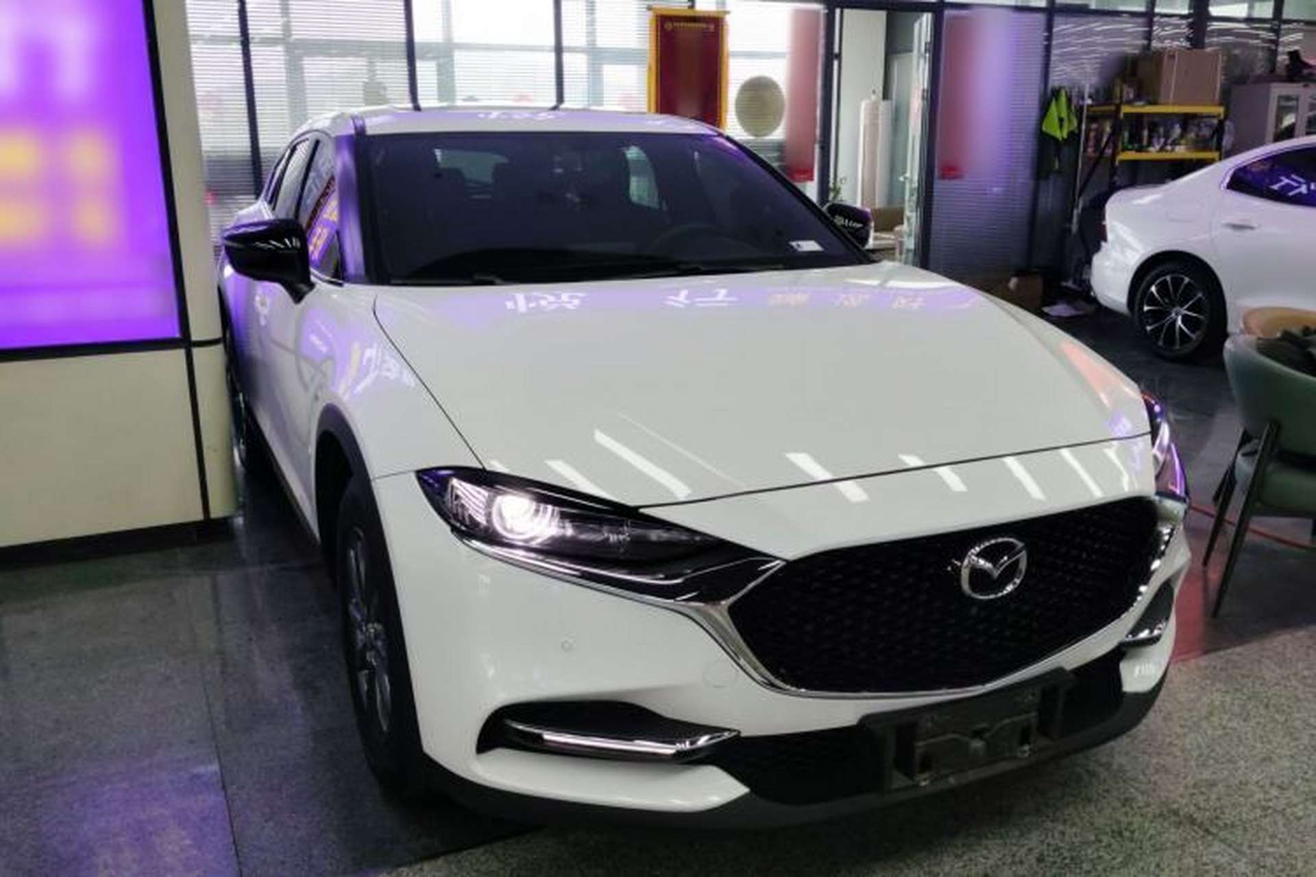 Used Mazda CX-4 2021 2.0L Automatic Two-Wheel Drive Blue Sky Exploration Edition Front Right 45 Deg