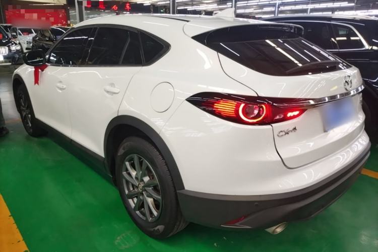 Used Mazda CX-4 2021 2.0L Automatic Two-Wheel Drive Blue Sky Dynamic Edition Rear Left 45 Deg