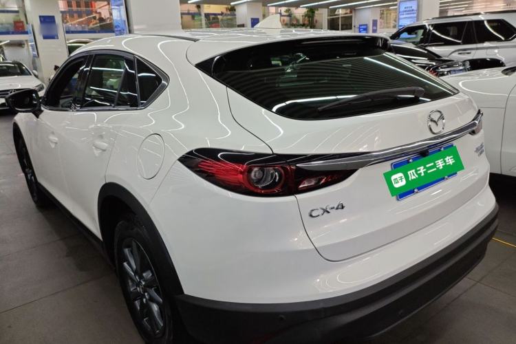 Used Mazda CX-4 2021 2.0L Automatic Two-Wheel Drive Blue Sky Dynamic Edition Rear Left 45 Deg