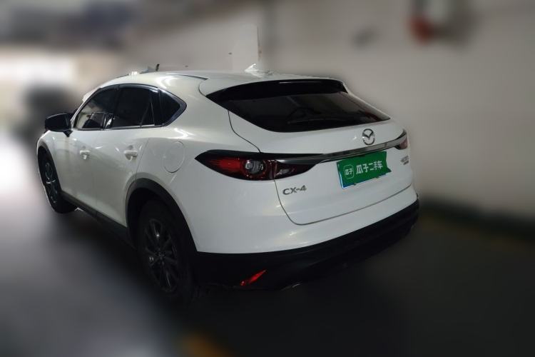 Used Mazda CX-4 2021 2.0L Automatic Two-Wheel Drive Blue Sky Exploration Edition Rear Left 45 Deg