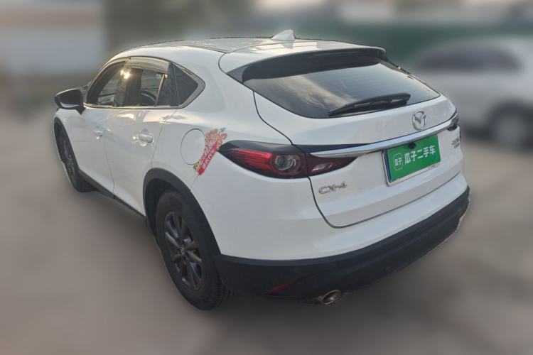Used Mazda CX-4 2021 2.0L Automatic Two-Wheel Drive Blue Sky Dynamic Edition Rear Left 45 Deg