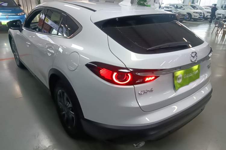 Used Mazda CX-4 2021 2.0L Automatic Two-Wheel Drive Blue Sky Dynamic Edition Rear Left 45 Deg