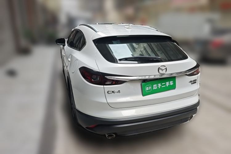 Used Mazda CX-4 2021 2.0L Automatic Two-Wheel Drive Blue Sky Luxury Edition Rear Left 45 Deg