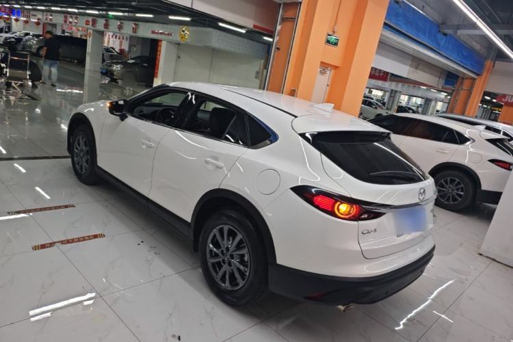 Used Mazda CX-4 2021 2.0L Automatic Two-Wheel Drive Blue Sky Exploration Edition Rear Left 45 Deg