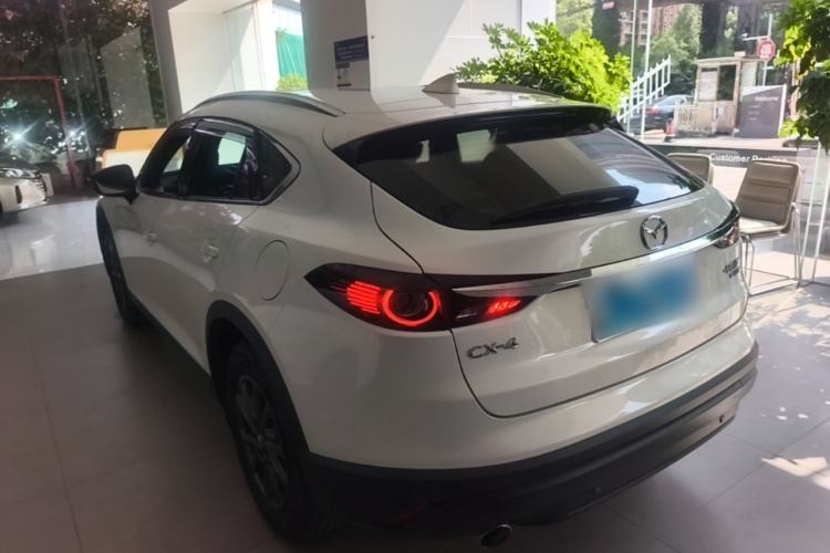 Used Mazda CX-4 2021 2.0L Automatic Two-Wheel Drive Blue Sky Luxury Edition Rear Left 45 Deg