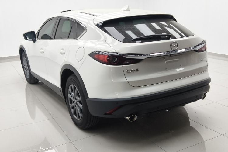 Used Mazda CX-4 2021 2.0L Automatic Two-Wheel Drive Blue Sky Dynamic Edition Rear Left 45 Deg