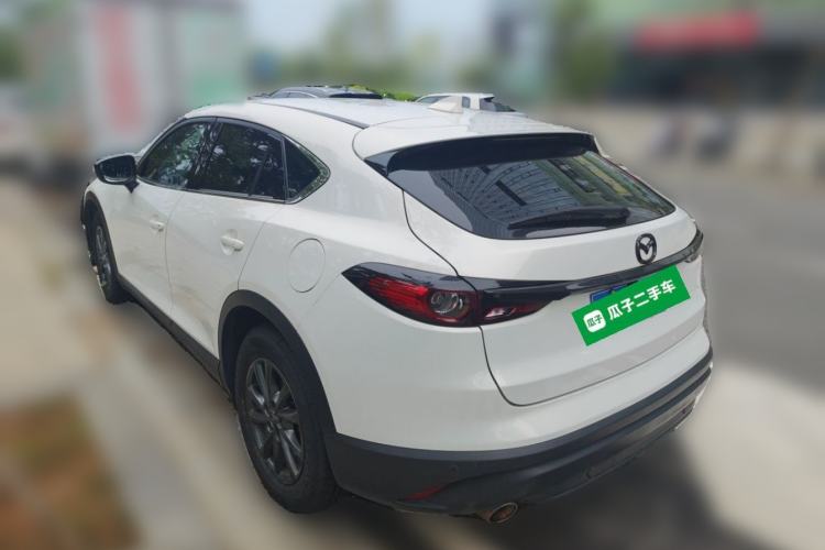 Used Mazda CX-4 2021 2.0L Automatic Two-Wheel Drive Blue Sky Dynamic Edition Rear Left 45 Deg
