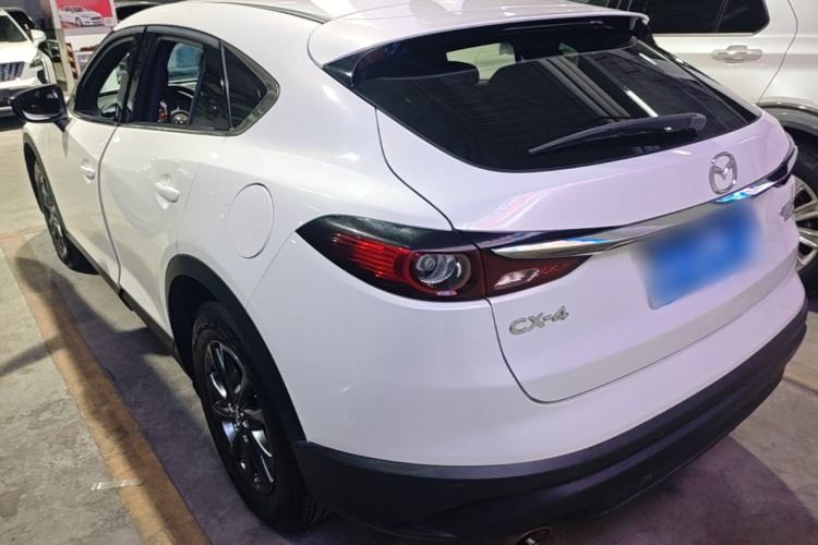 Used Mazda CX-4 2021 2.0L Automatic Two-Wheel Drive Blue Sky Exploration Edition Rear Left 45 Deg