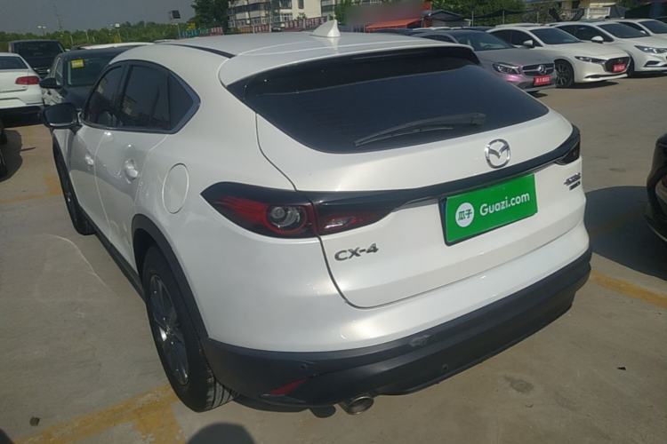 Used Mazda CX-4 2021 2.0L Automatic Two-Wheel Drive Blue Sky Exploration Edition Rear Left 45 Deg