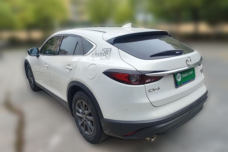 Used Mazda CX-4 2021 2.0L Automatic Two-Wheel Drive Blue Sky Dynamic Edition Rear Left 45 Deg