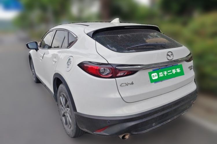 Used Mazda CX-4 2021 2.0L Automatic Two-Wheel Drive Blue Sky Exploration Edition Rear Left 45 Deg
