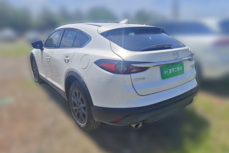 Used Mazda CX-4 2021 2.0L Automatic Two-Wheel Drive Blue Sky Dynamic Edition Rear Left 45 Deg