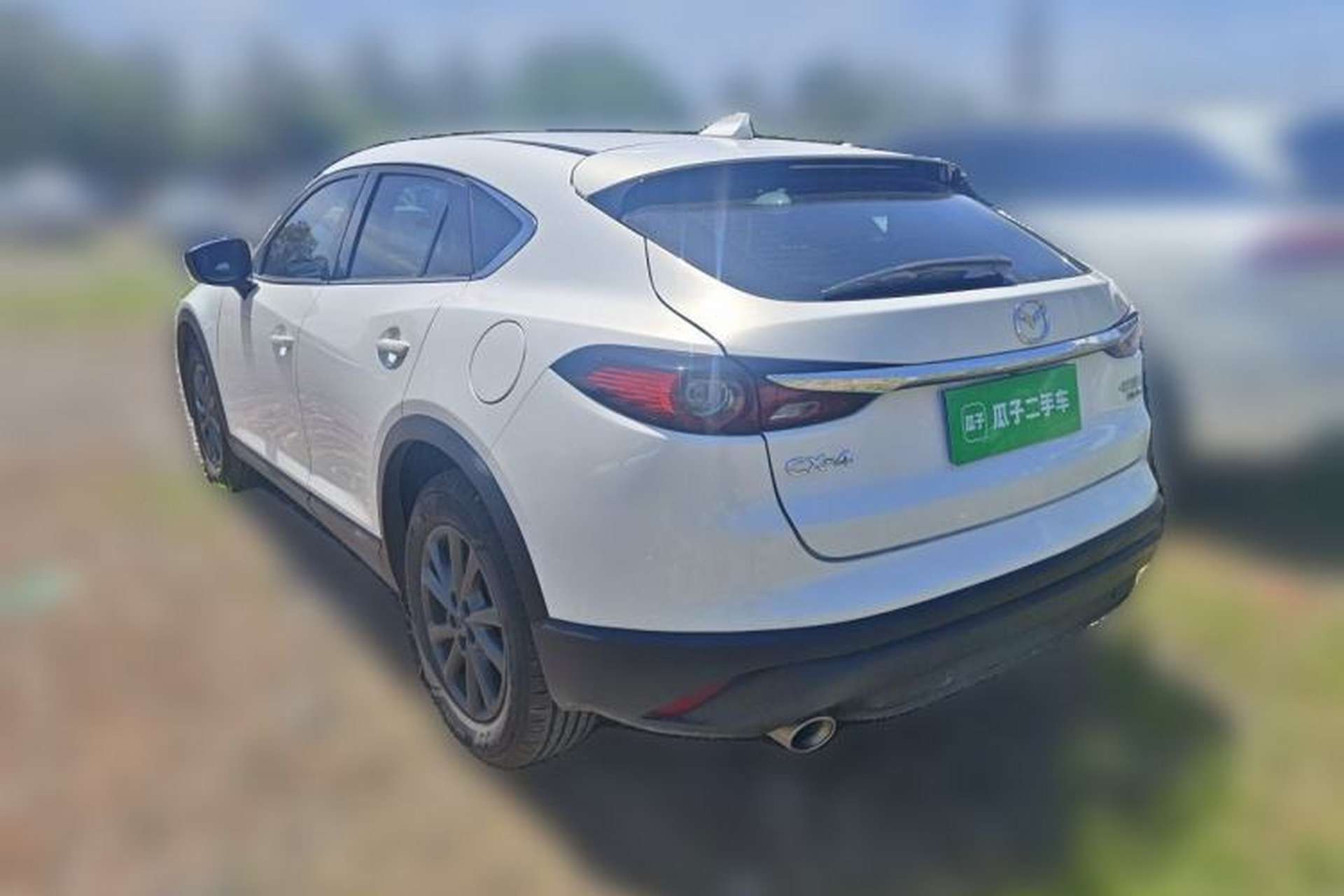 Used Mazda CX-4 2021 2.0L Automatic Two-Wheel Drive Blue Sky Dynamic Edition Rear Left 45 Deg