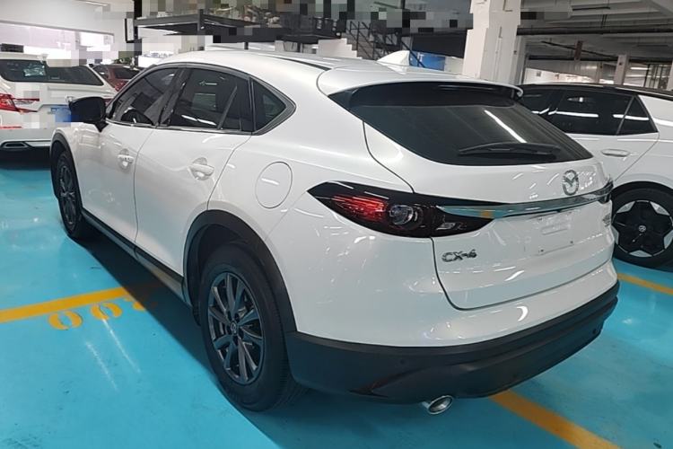Used Mazda CX-4 2021 2.0L Automatic Two-Wheel Drive Blue Sky Exploration Edition Rear Left 45 Deg