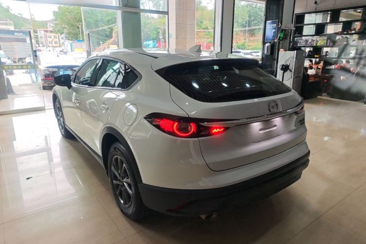 Used Mazda CX-4 2021 2.0L Automatic Two-Wheel Drive Blue Sky Exploration Edition Rear Left 45 Deg