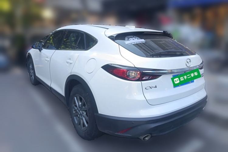 Used Mazda CX-4 2021 2.0L Automatic Two-Wheel Drive Blue Sky Exploration Edition Rear Left 45 Deg