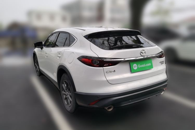Used Mazda CX-4 2021 2.0L Automatic Two-Wheel Drive Blue Sky Dynamic Edition Rear Left 45 Deg