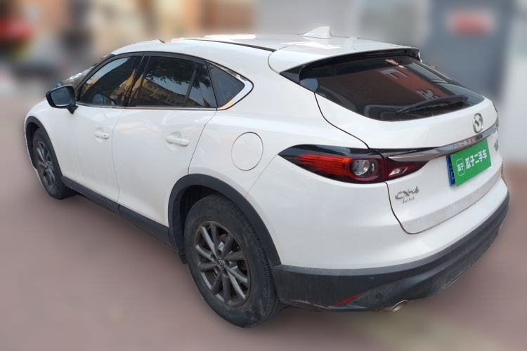 Used Mazda CX-4 2021 2.0L Automatic Two-Wheel Drive Blue Sky Dynamic Edition Rear Left 45 Deg