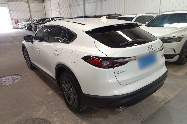 Used Mazda CX-4 2021 2.0L Automatic Two-Wheel Drive Blue Sky Exploration Edition Rear Left 45 Deg