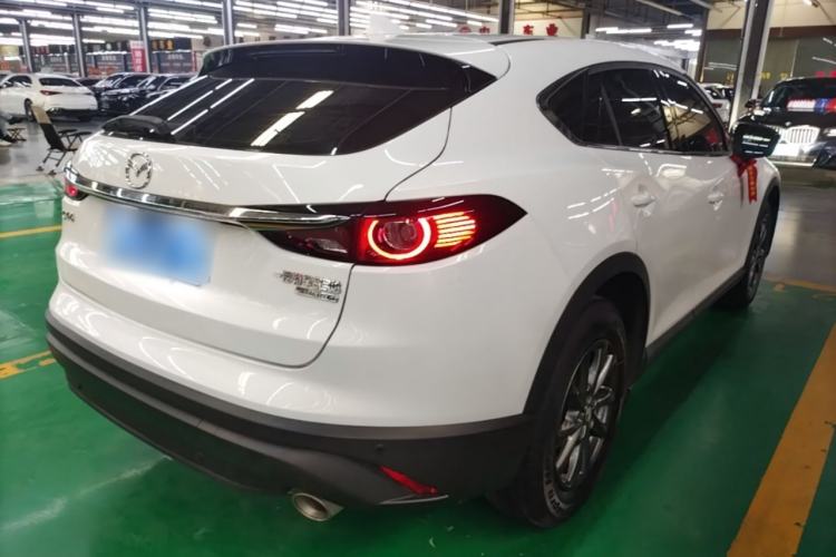 Used Mazda CX-4 2021 2.0L Automatic Two-Wheel Drive Blue Sky Dynamic Edition Rear Right 45 Deg