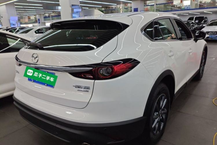 Used Mazda CX-4 2021 2.0L Automatic Two-Wheel Drive Blue Sky Dynamic Edition Rear Right 45 Deg