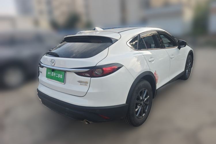 Used Mazda CX-4 2021 2.0L Automatic Two-Wheel Drive Blue Sky Dynamic Edition Rear Right 45 Deg