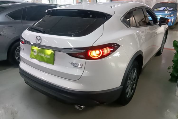 Used Mazda CX-4 2021 2.0L Automatic Two-Wheel Drive Blue Sky Dynamic Edition Rear Right 45 Deg