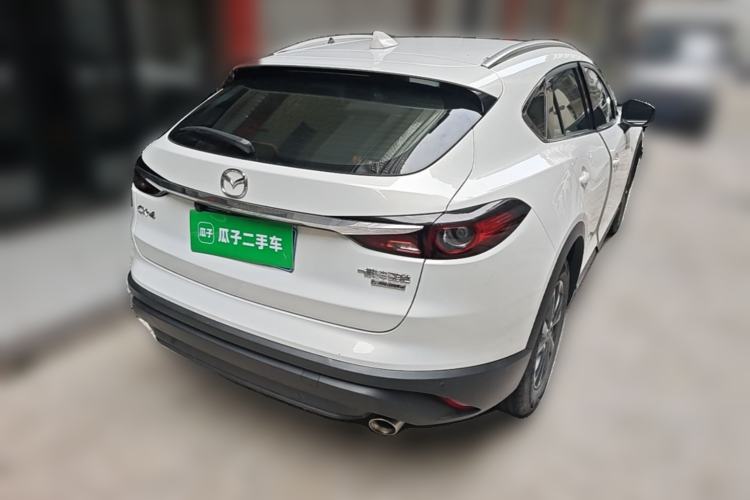 Used Mazda CX-4 2021 2.0L Automatic Two-Wheel Drive Blue Sky Luxury Edition Rear Right 45 Deg