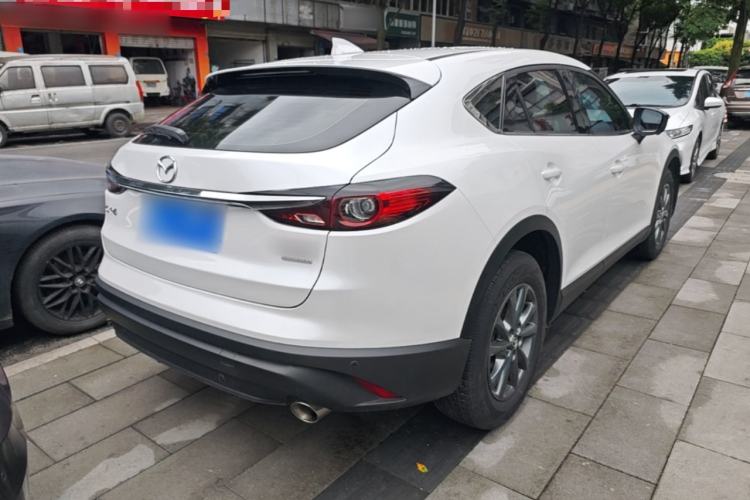 Used Mazda CX-4 2021 2.0L Automatic Two-Wheel Drive Blue Sky Dynamic Edition Rear Right 45 Deg