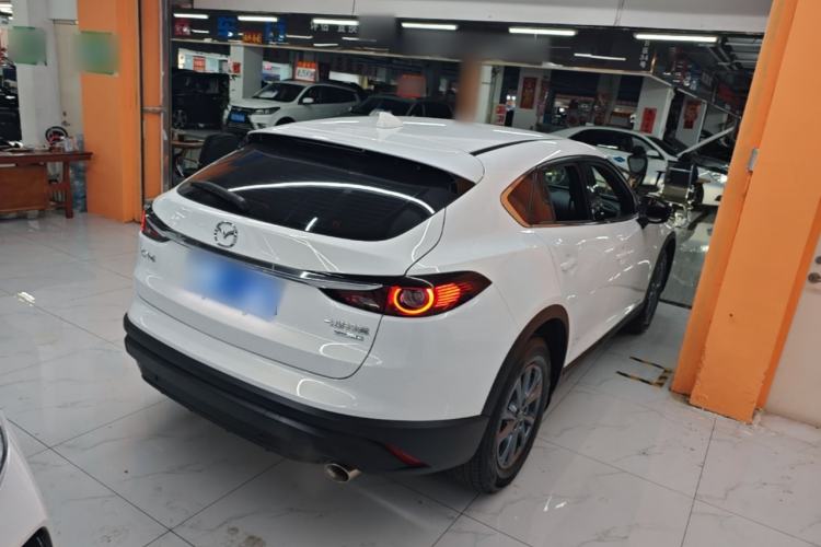 Used Mazda CX-4 2021 2.0L Automatic Two-Wheel Drive Blue Sky Exploration Edition Rear Right 45 Deg