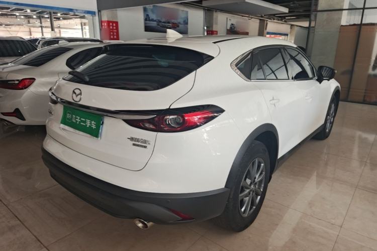 Used Mazda CX-4 2021 2.0L Automatic Two-Wheel Drive Blue Sky Dynamic Edition Rear Right 45 Deg
