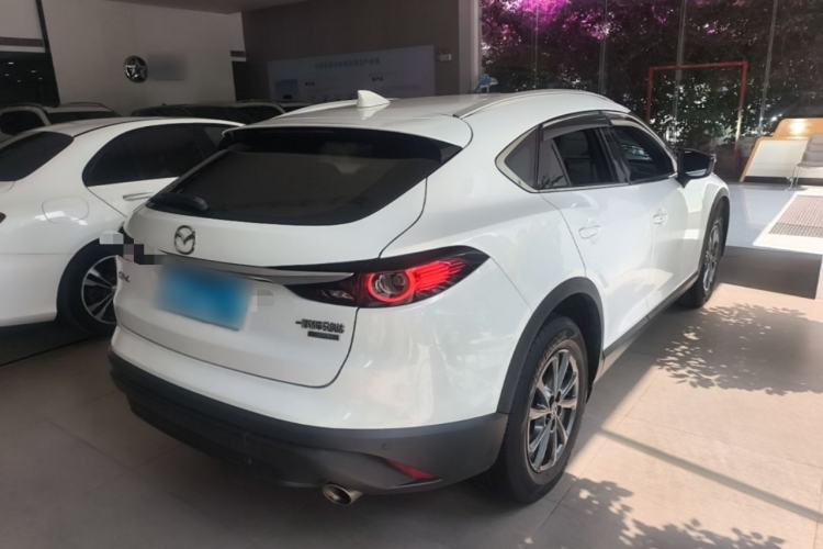 Used Mazda CX-4 2021 2.0L Automatic Two-Wheel Drive Blue Sky Luxury Edition Rear Right 45 Deg