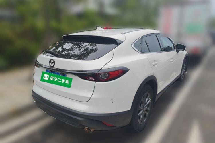 Used Mazda CX-4 2021 2.0L Automatic Two-Wheel Drive Blue Sky Dynamic Edition Rear Right 45 Deg
