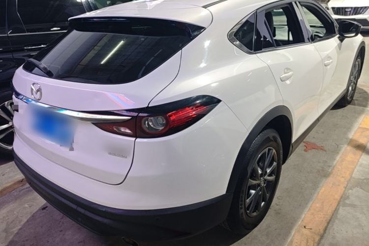 Used Mazda CX-4 2021 2.0L Automatic Two-Wheel Drive Blue Sky Exploration Edition Rear Right 45 Deg