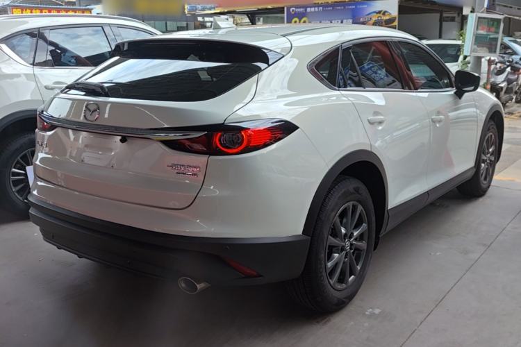 Used Mazda CX-4 2021 2.0L Automatic Two-Wheel Drive Blue Sky Dynamic Edition Rear Right 45 Deg