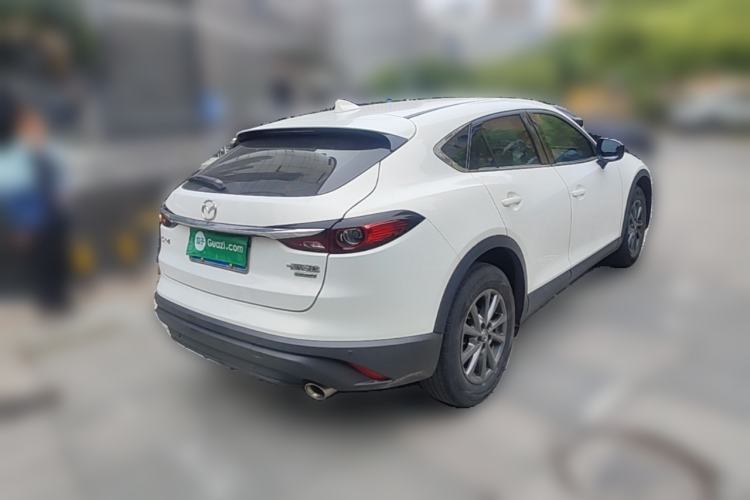Used Mazda CX-4 2021 2.0L Automatic Two-Wheel Drive Blue Sky Dynamic Edition Rear Right 45 Deg