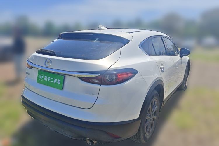 Used Mazda CX-4 2021 2.0L Automatic Two-Wheel Drive Blue Sky Dynamic Edition Rear Right 45 Deg
