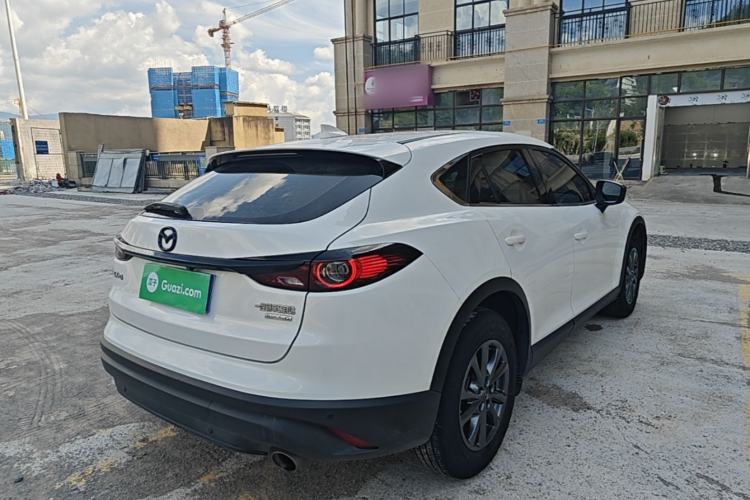 Used Mazda CX-4 2021 2.0L Automatic Two-Wheel Drive Blue Sky Dynamic Edition Rear Right 45 Deg